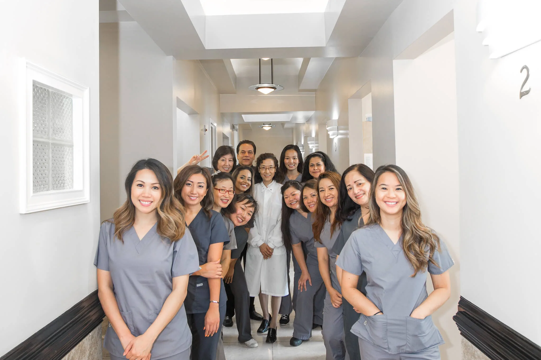 Our friendly dental team in the hallway of our Chamblee office